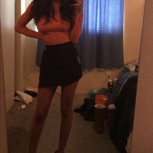 A black asymmetrical skort